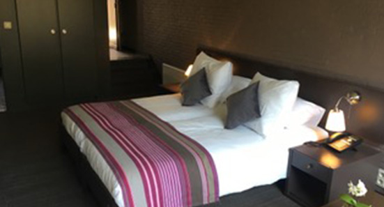 View on a bed in a hotel bedroom
